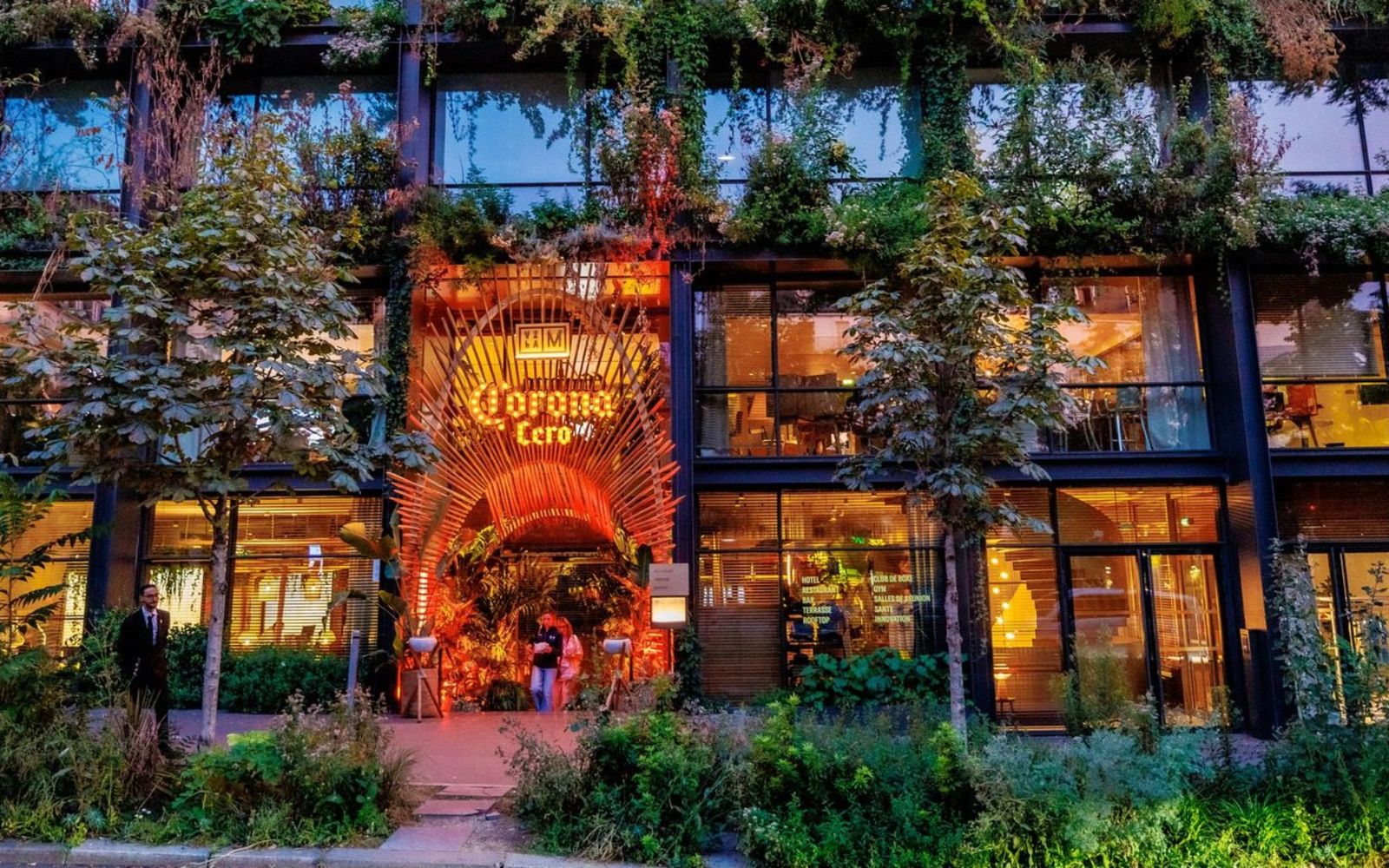 Corona Cero venue in Paris, covered in plants and warm light